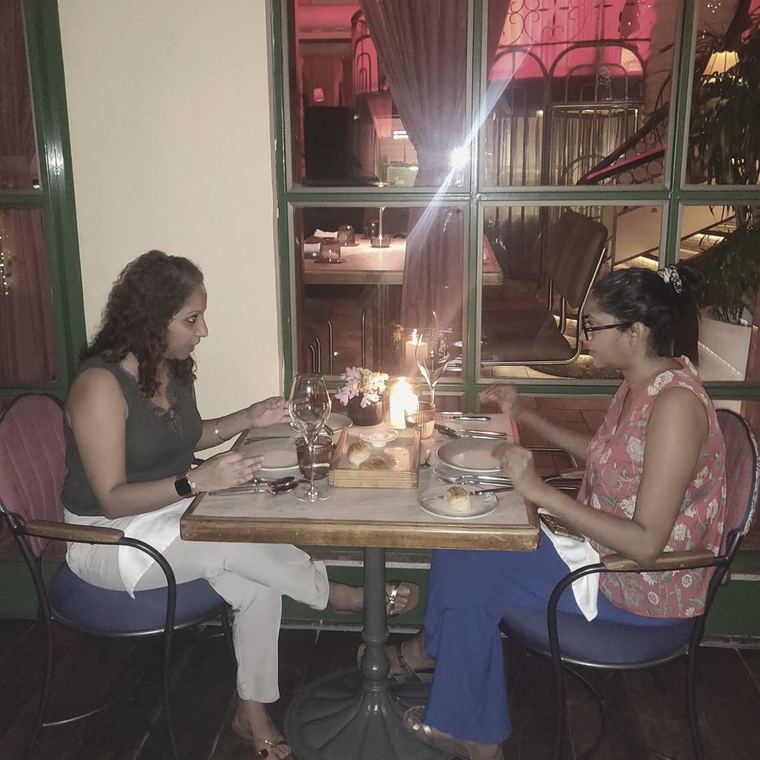Dining etiquette session at a restaurant table